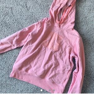 Pink under armour hoodie with zip pockets